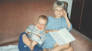 This is the reading-couch, but I was older than this when my mom read about St. Damien.