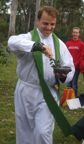 Fr. Tim executes the Sprinkling Rite with gusto and excitement. 