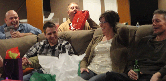 I figured you needed to see this picture. Uncle Jim is the one holding the red box. 