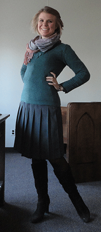 Blue sweater! And grey skirt and brown tights-and-boots! The scarf is colorful but subtle. 