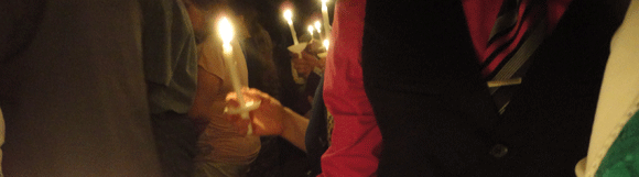 When the sun has set, the lights of the church remain extinguished. An ancient song, the Exsultet, is chanted reminding us of our God and our story of redemption. Outside, a fire is lit and a brand-spankin' new Easter candle is blessed, lit, and brought in to light the candles of all those in the church. 