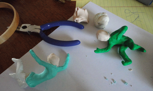 Here are both figures, now clay-covered...but needing their hats! 