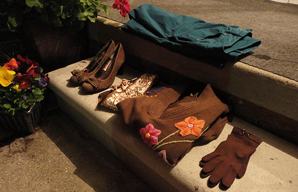 Starting on the left: shoes, belt, sweater, gloves, and some pants. 