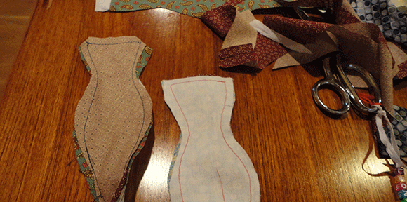 Step three: Sew the facing onto the material parts. Right sides in. 