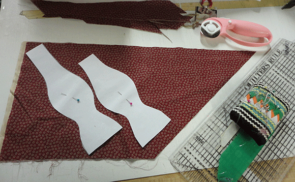 Step one. Cut stuff out. I used Martha Stewart's pattern and a coworker's bow tie for guides. 