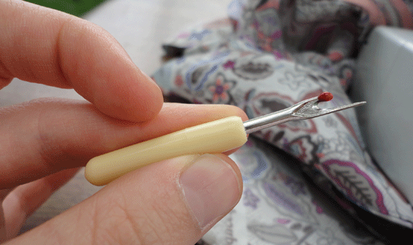 Side problem #2: new needle thread tension is wrong. Enter the seam-ripper...a seamstress' best friend. 