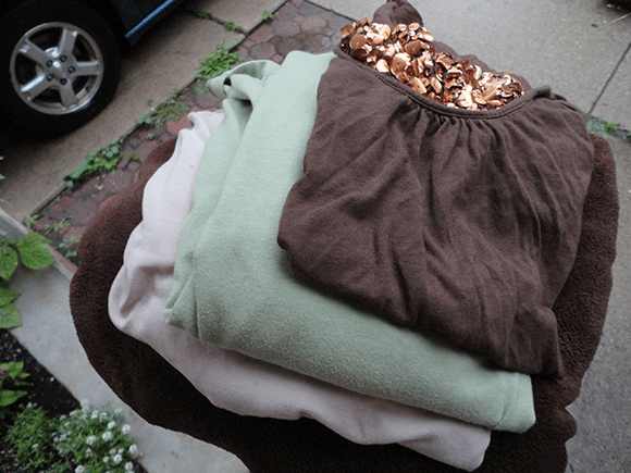 Start: material. I went to a legit material store, but all of the materials were in grown-up shades. So! Next-best thing--shirts. :) I picked out the softest in the shades I liked best. And that brown fur on the bottom is a fuzzy throw. 