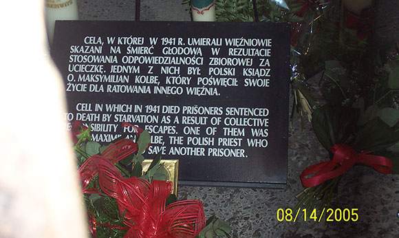 The plaque was behind a fence of sorts. 