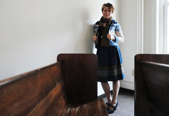 With sweater. It was mild today, so I didn't wear the down jacket, just this woolen vest. 