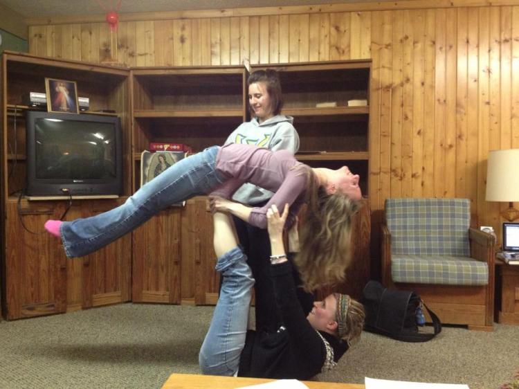 Danielle teaches us how to do circus on retreat last year. 