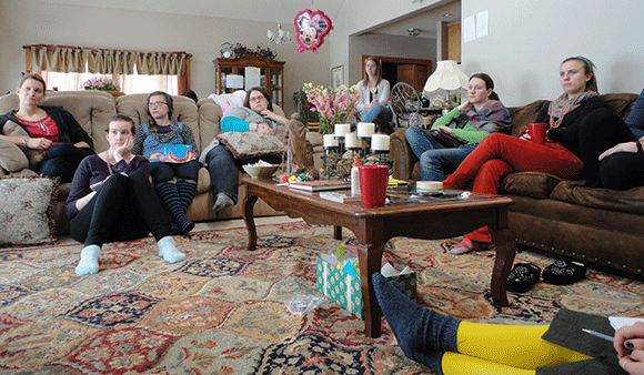 Sitting, listening. :)