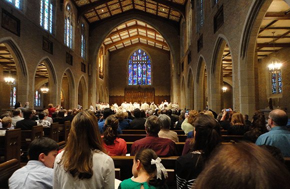 I didn't share this earlier, but this is a photo from the Deacon ordination. I loved this part: other priests came and gave them their new vestments--it reminded me of the photos where the moms veil the brides. 