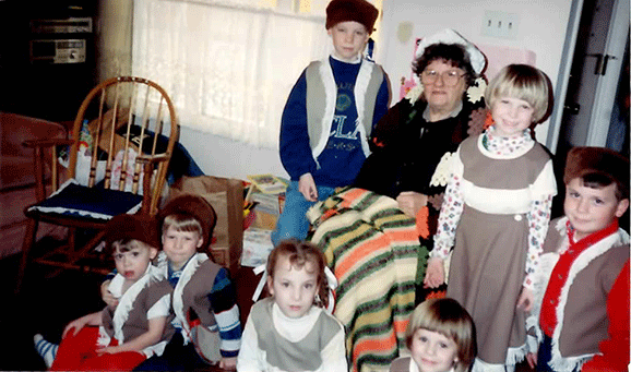 My grandma plays pretend as the Pioneer Grandma with her grandkiddos. 
