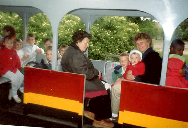 Here's a vintage pic of my grandma and my mom and my two youngest brothers on the "train" that chugs through our local zoo. 