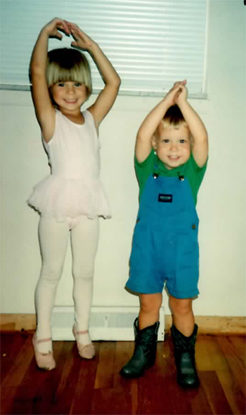 Christine and leetle Josh in his baby cowboy boots reenact the dream sequence from "Oklahoma." Cough. Or something. 