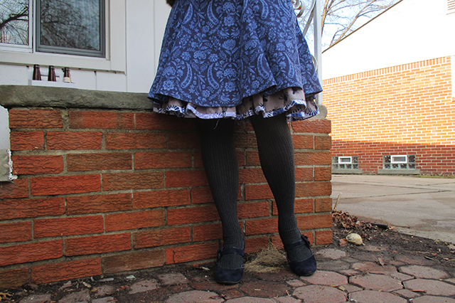 Bonus good news: this is day two WITHOUT BOOTS. So instead I wore my second-from-highest heels. The ones with the over-the-top flowers on the sides. Also note: my tights will perpetually bunch at my ankles. I am 75 years old. 