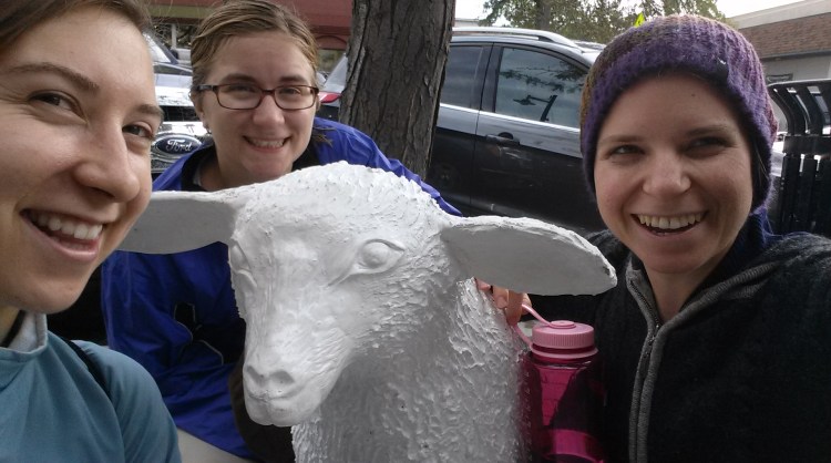 Final picture! This was us in the leetle Michigan beach-town...with this fiberglass lamb. 