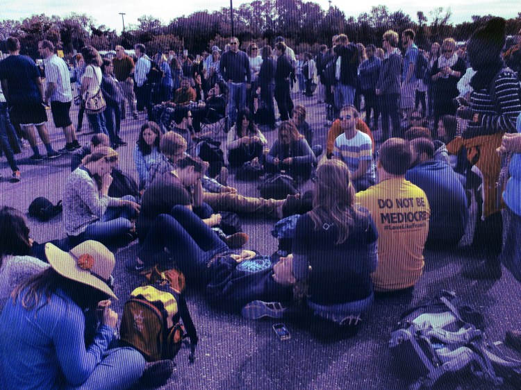 (This is what it looks like when your group starts praying an international rosary in the middle of a long line). 