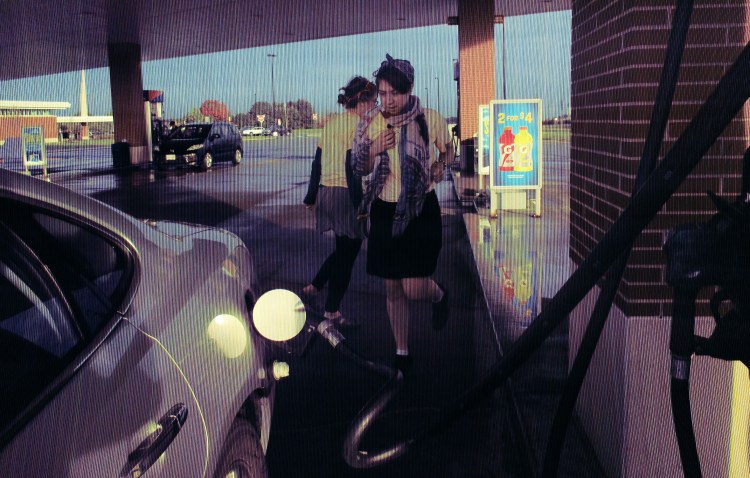 (This is Juli-YEAH doing a stretch-the-legs dance at a gas station). 